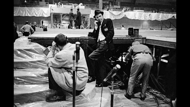 Legendary entertainer Frank Sinatra, center, prepares for the inaugural gala the night before Kennedy's inauguration. Sinatra had campaigned for Kennedy and had worked to organize a star-studded gala for him. Among those who attended were Harry Belafonte, Nat King Cole, Gene Kelly and Bette Davis.