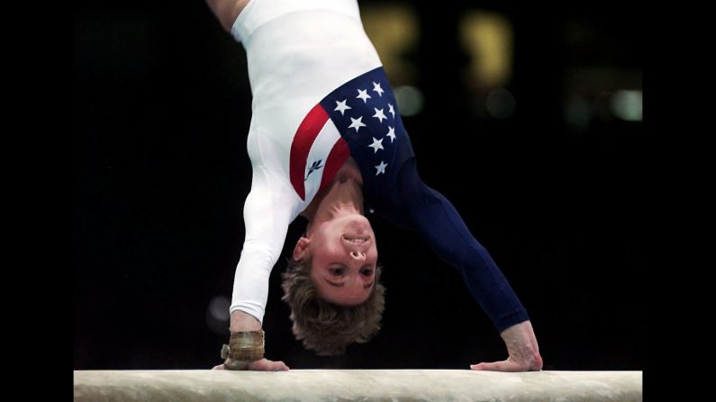 Kerri Strug vaults during the women's team gymnastics competition at the Summer Olympic Games in Atlanta in July 1996. Strug injured her left ankle following this routine but completed her second vault to clinch the team gold medal for the US women.