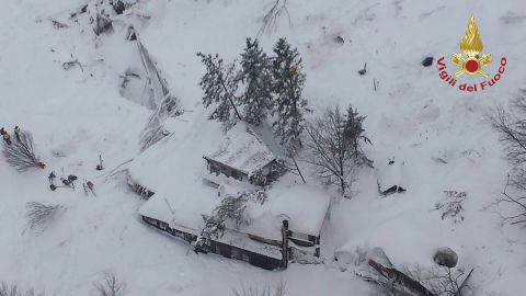 An aerial view shows the roof and top floor of the three-story Hotel Rigopiano buried in snow after the avalanche struck at the foot of Gran Sasso mountain in central Italy on Thursday, January 19.