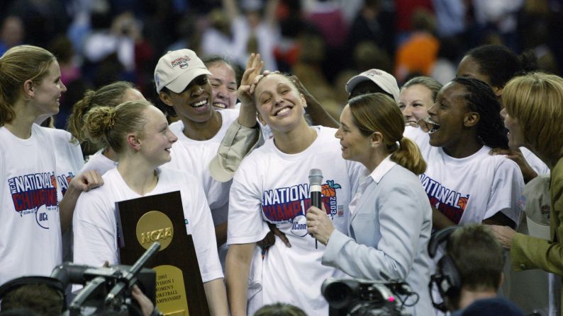 Connecticut's Diana Taurasi leads her teammates in celebration after winning the NCAA women's basketball championship game on April 8, 2003 at the Georgia Dome. UConn defeated Tennessee, 73-68.