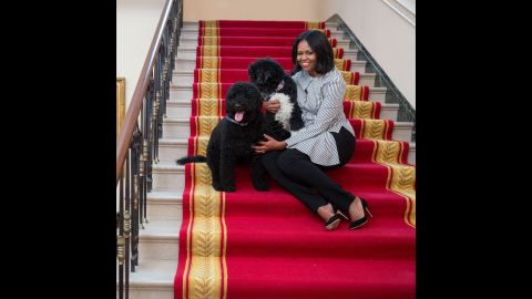 Obama poses with dogs Bo and Sunny as the family prepares to depart the White House in January 2017. In an accompanying tweet, she writes: "Thank you for the birthday wishes and for the greatest gift of all: the opportunity to serve as your First Lady."