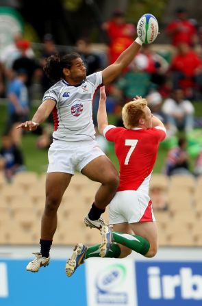 "In sevens if you've got the ball and you control it for long periods of time and stay accurate with your pass, then the defense is generally working harder and that's where the fatigue element starts to set in. So your set piece becomes vitally important." Here players contest a kickoff in a match between the US and Wales.