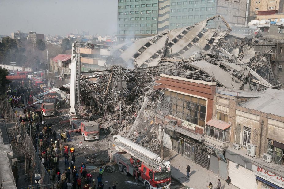 The rubble of the Plasco building in Tehran, Iran, is seen after it collapsed following a fire on Thursday, January 19. As many as 30 firefighters are feared dead, according to Iran's semi-official Fars news agency. Official news agency IRNA cited the head of Tehran Emergency Services as saying 70 people were injured in the fire.