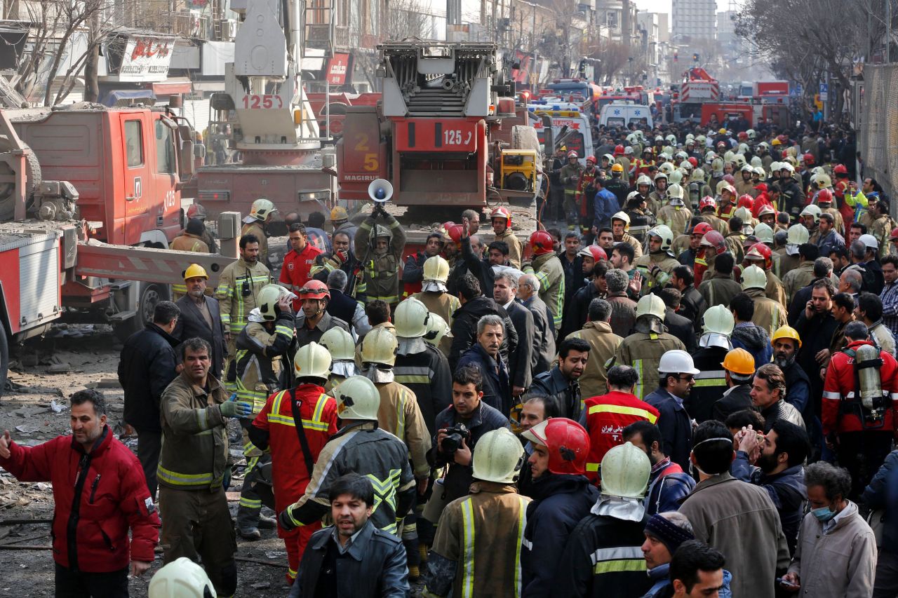 Tehran: 'More than 20 firefighters dead' in Iran building collapse | CNN