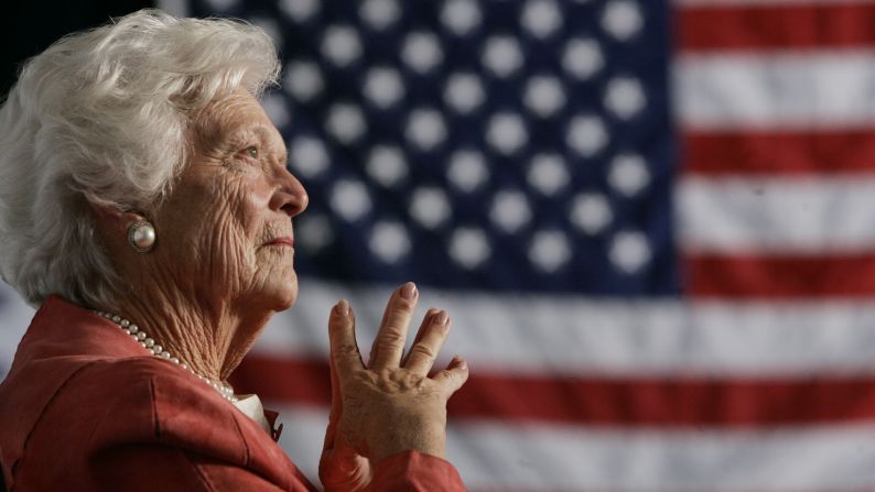 <a href="index.php?page=&url=https%3A%2F%2Fwww.cnn.com%2F2018%2F04%2F17%2Fpolitics%2Fbarbara-bush-dies%2Findex.html">Former first lady Barbara Bush</a>, the matriarch of a Republican political dynasty and a first lady who elevated the cause of literacy, died April 17, 2018, at age 92. Here, she listens as her son, President George W. Bush, addresses an event in Orlando in 2005. She was the second woman in US history to have had a husband and a son elected President. Her husband, George H.W. Bush, was the 41st President of the United States. Her son was the 43rd.