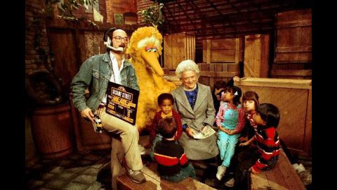 Bush reads to children and Big Bird on the set of "Sesame Street" in October 1989.