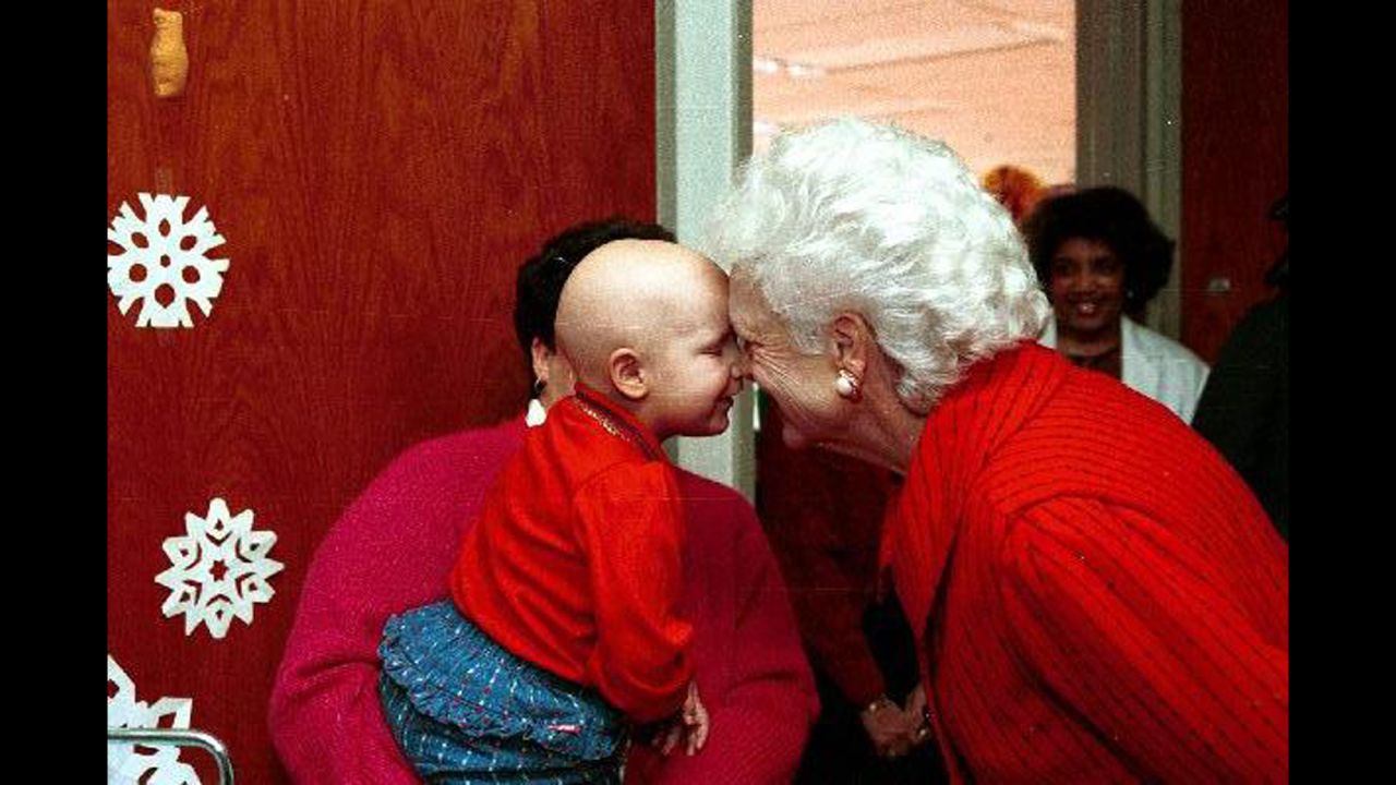 Bush visits a children's hospital during Christmas celebrations in Washington on December 6, 1990.