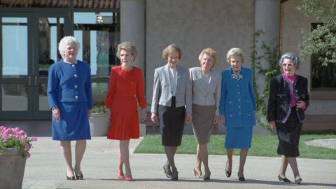 Six former first ladies take a stroll through the courtyard of the Ronald Reagan Presidential Library. Pictured from left are Bush, Nancy Reagan, Rosalynn Carter, Betty Ford, Pat Nixon and Lady Bird Johnson.