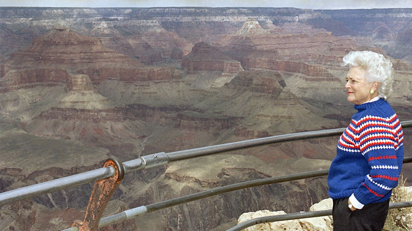 The first lady looks out over Hopi Point during her first visit to the Grand Canyon on  April 13, 1991. Bush was there to kick off celebrations for the 75th anniversary of the National Park Service.