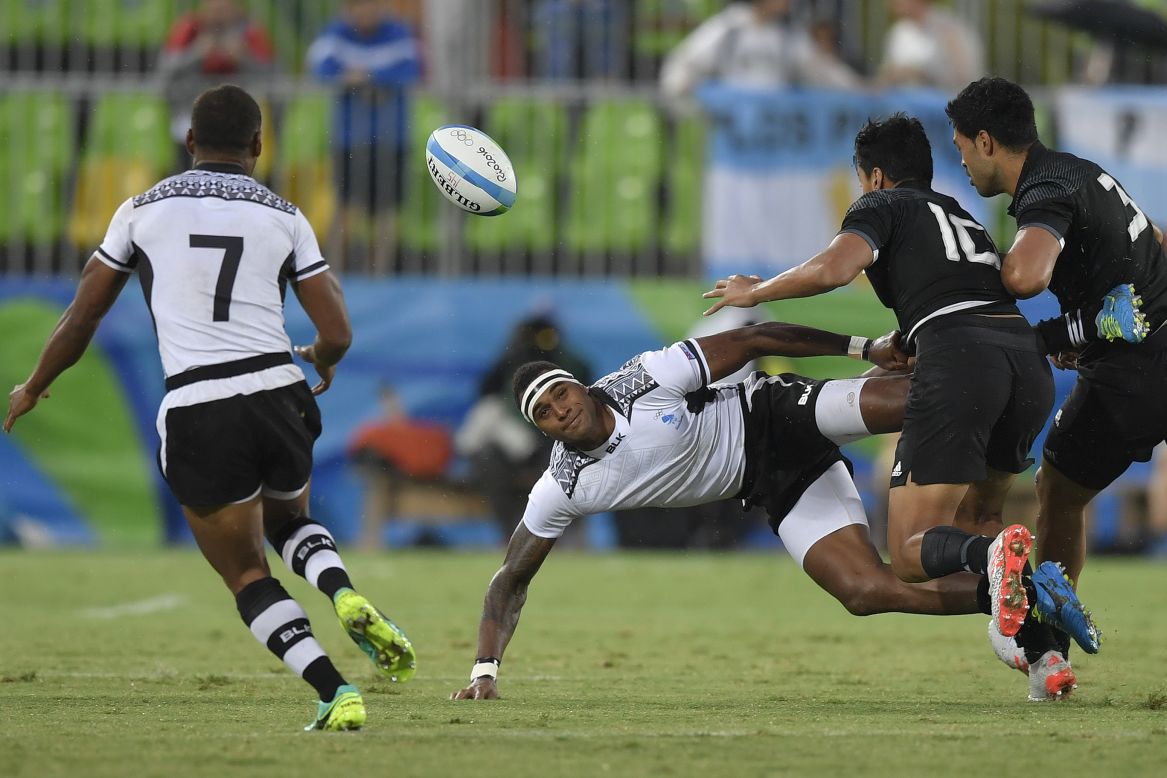 "In sevens you have to pass effectively whilst traveling at speed over greater distance than you would in 15s," the Welshman adds. "You have to pass the ball backwards to move forwards, which catches a lot of people out." Here Fiji's Semi Kunatani offloads a pass while falling against New Zealand at the Rio 2016 Olympics. 