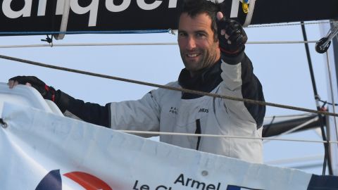 Armel Le Cleac'h celebrates as he arrives at Les Sables d'Olonne.