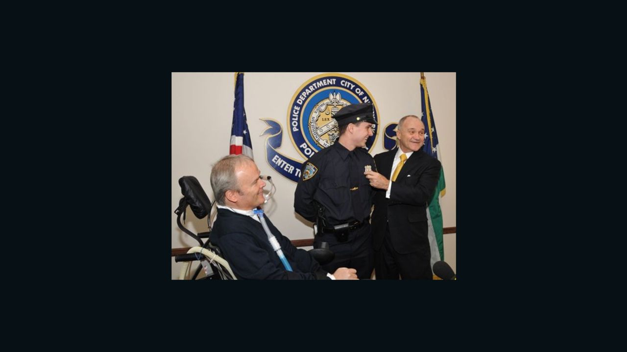 Detective Steven McDonald joined his son Conor as he received his police officer shield.