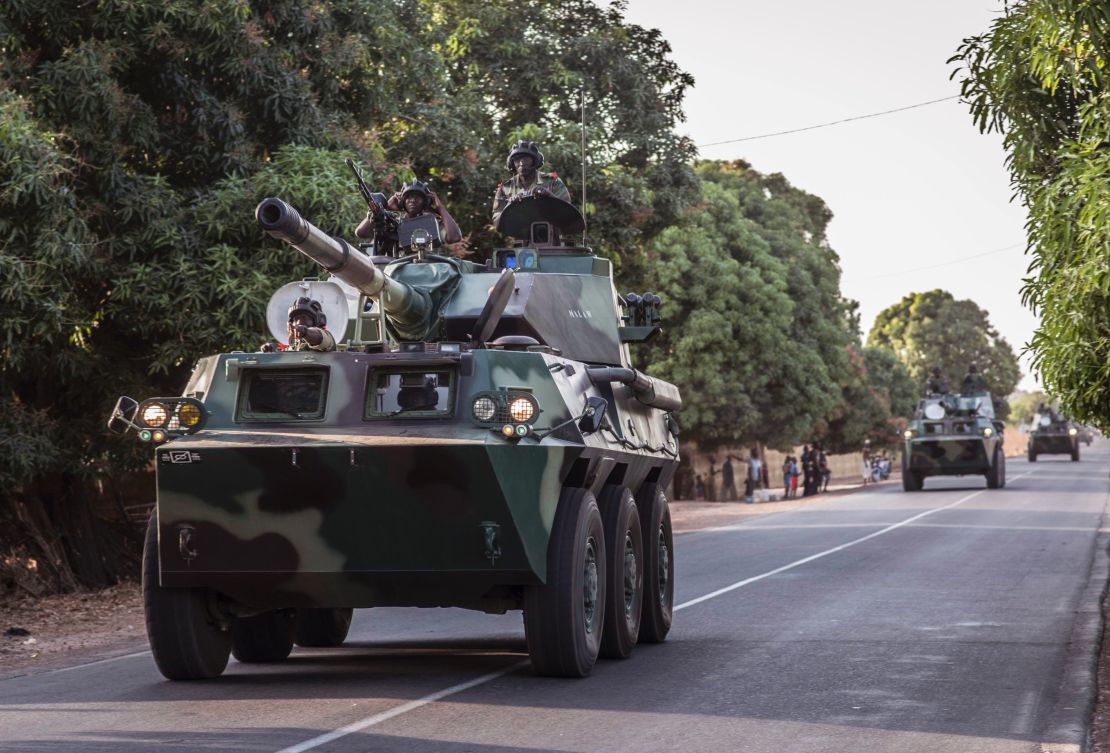 A convoy of Senegalese soldiers head toward Gambia's border Thursday.