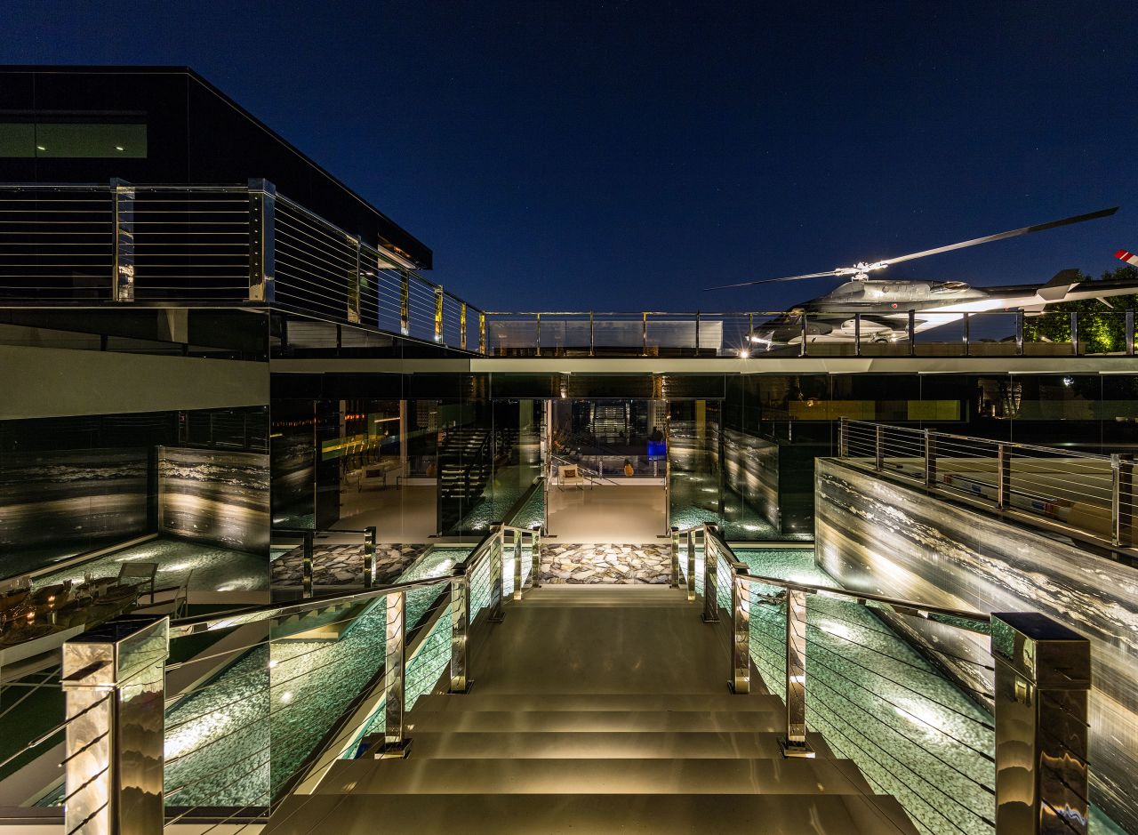The house also features an 85-foot glass infinity pool.