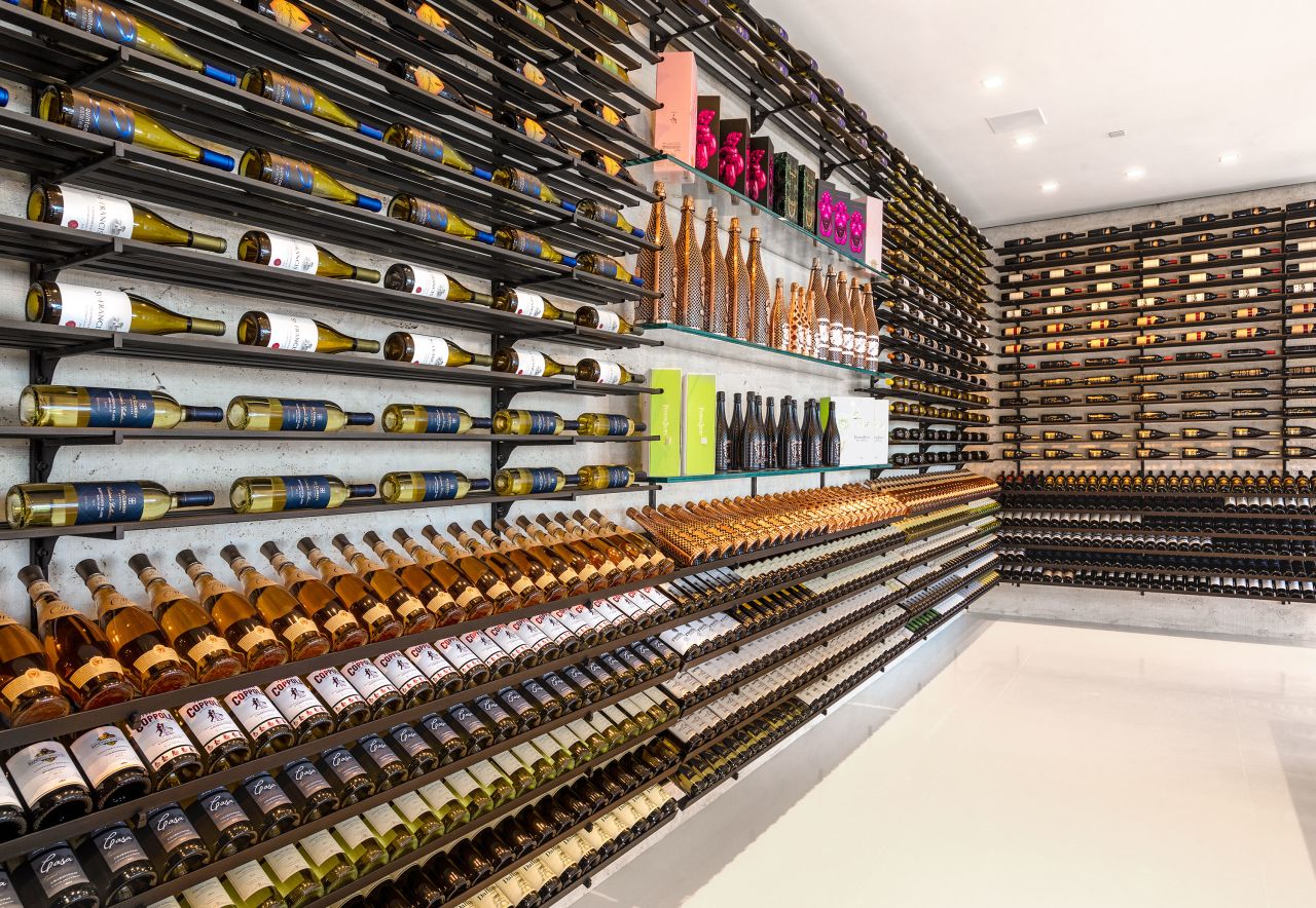 The house features two fully stocked wine rooms. 