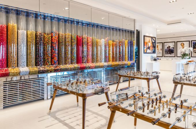 Among the house's many perks is a games room, complete with a candy wall. 