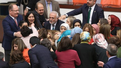 Turkish lawmakers scuffle inside Ankara's parliament on Wednesday. 


