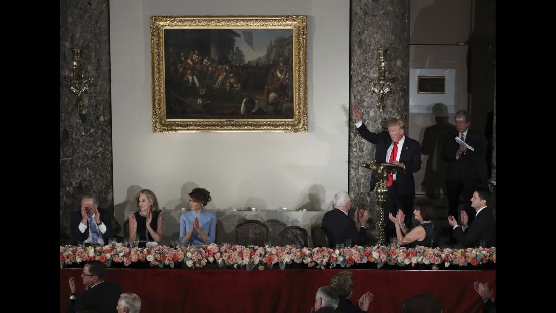 President Trump waves to Hillary Clinton, whom he defeated in the election, during his speech at the inaugural luncheon. He was sworn in as the 45th President of the United States on Friday, January 20.