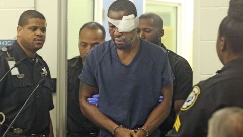 Markeith Loyd is escorted into a courtroom for a hearing Friday at the Orange County Jail in Orlando.