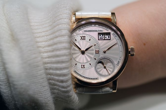 "A great example of a "ladies" watch done well. It's rose gold case is 36mm in diameter and the watch has a beautiful silvered guilloché dial made of solid gold. It's an interesting complication with <a target="_blank" target="_blank">Lange's</a> familiar and impressive finishing." -- Cara Barrett