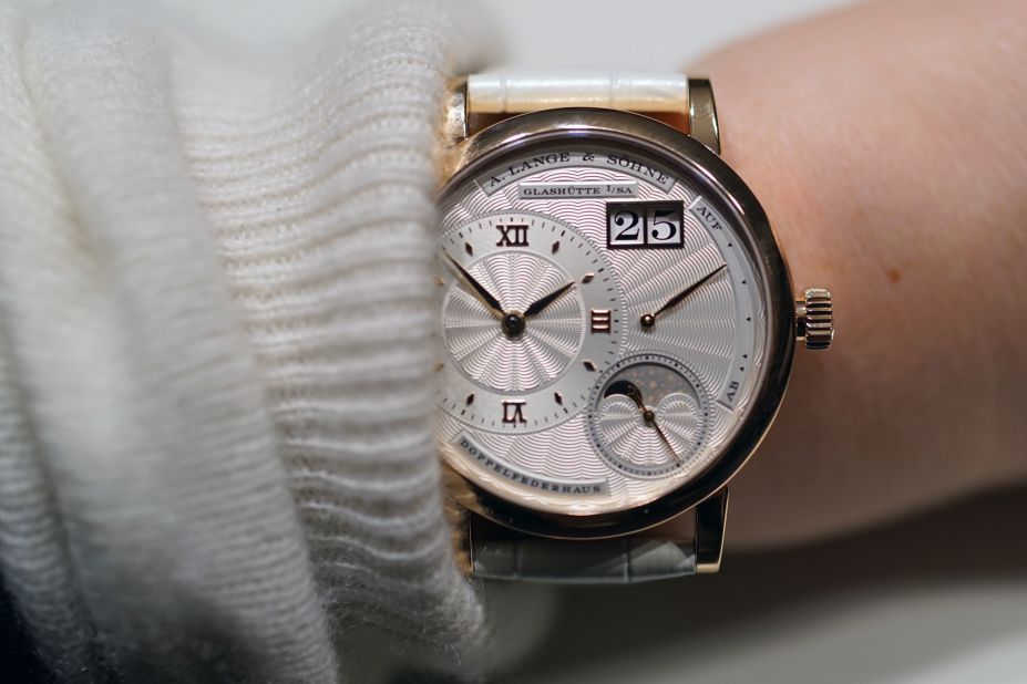 "A great example of a "ladies" watch done well. It's rose gold case is 36mm in diameter and the watch has a beautiful silvered guilloché dial made of solid gold. It's an interesting complication with <a href="https://www.hodinkee.com/articles/a-lange-little-lange-1-moon-phase-hands-on" target="_blank" target="_blank">Lange's</a> familiar and impressive finishing." -- Cara Barrett