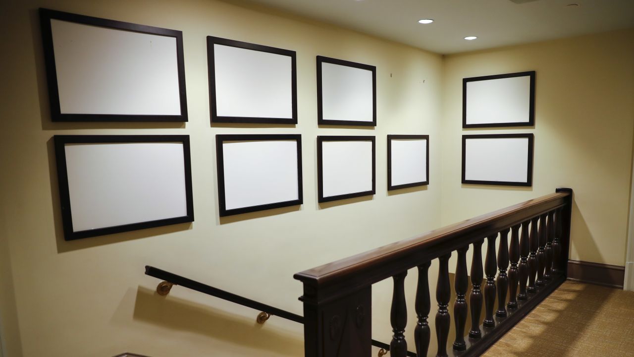 Photos of Barack Obama and his family, which lined walls in the West Wing of the White House, are removed on Thursday, January 19. Obama's presidency came to an end the following day, when Donald Trump was sworn in as the 45th president. <a href="http://www.cnn.com/2017/01/17/politics/obamas-moving-day/" target="_blank">The Obamas are moving</a> to a house in Washington's Kalorama neighborhood.