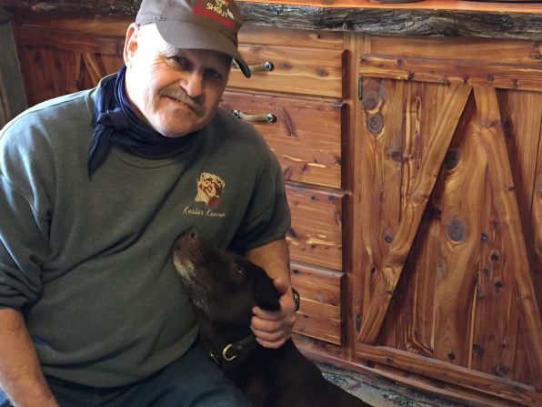 Pat Keslar is a retired bank president who says he could have left Hyannis to make big money but stayed to pursue his dream of raising hunting dogs and quarter horses. He was a Trump supporter from day one, shows off his vaulted safe full of rifles and ammunition and says, mocking Clinton, "I'm one of those deplorables -- and proud of it." With him is Jaws, a hunter retriever champion. 