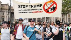 MELBOURNE, AUSTRALIA - NOVEMBER 20:  Anti-racism protesters gather to counter protest against a Donald Trump victory rally outside State Parliament on November 20, 2016 in Melbourne, Australia. The election of Donald Trump in America has sparked protests and rallies across the world.  (Photo by Quinn Rooney/Getty Images)