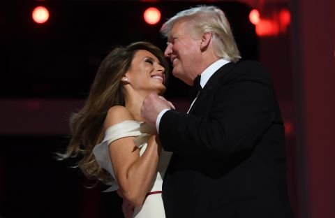 The first lady dances with her husband at an inaugural ball.