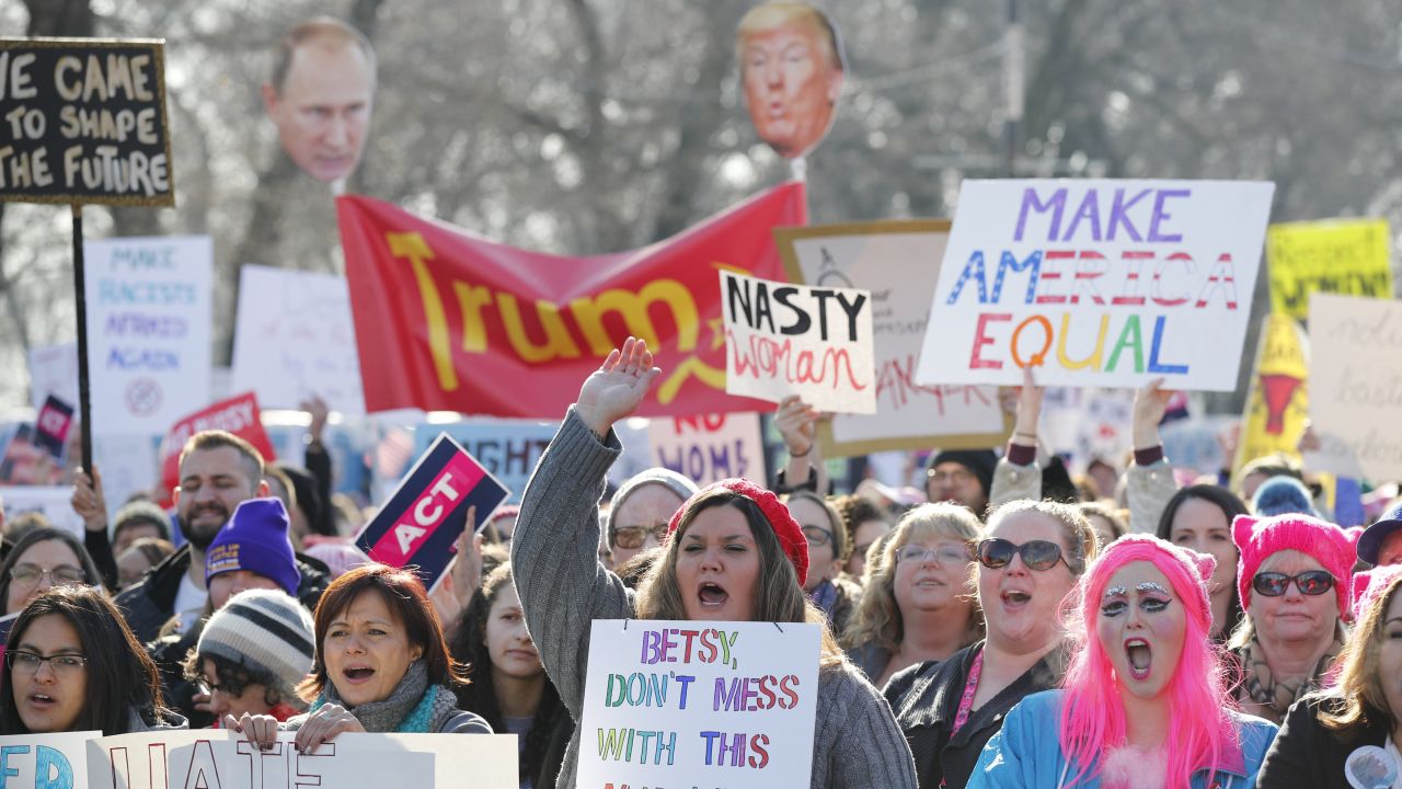 Protesters cheer at the Women's March in Chicago, Illinois.