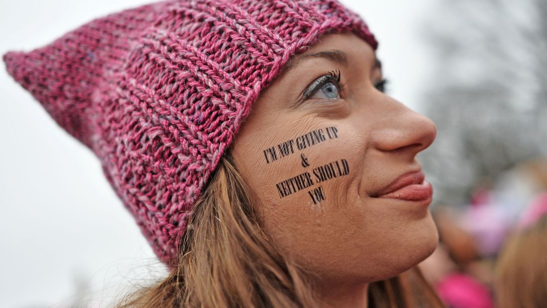 A woman wears a pink hat to send a message during the protest.