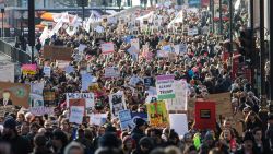 LONDON, ENGLAND - JANUARY 21: Protesters march from The US Embassy in Grosvenor Square towards Trafalgar Square during the Women's March on January 21, 2017 in London, England. The WomenÕs March originated in Washington DC but soon spread to be a global march calling on all concerned citizens to stand up for equality, diversity and inclusion and for womenÕs rights to be recognised around the world as human rights. Global marches are now being held, on the same day, across seven continents. (Photo by Jack Taylor/Getty Images)