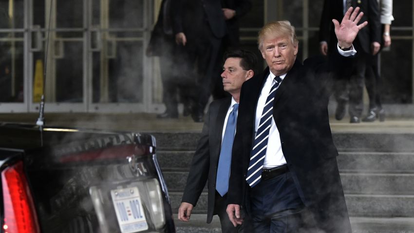 US President Donald Trump makes his way to his limousine following a visit to the Central Intelligence Agency (CIA) in Langley, Virginia, on January 21, 2017.
Trump told the CIA Saturday it had his fervent support as he paid a visit to mend fences after publicly rejecting its assessment that Russia tried to help him win the US election. "I am with you 1,000 percent," Trump said in a short address to CIA staff after his visit to the agency headquarters in Virginia.
