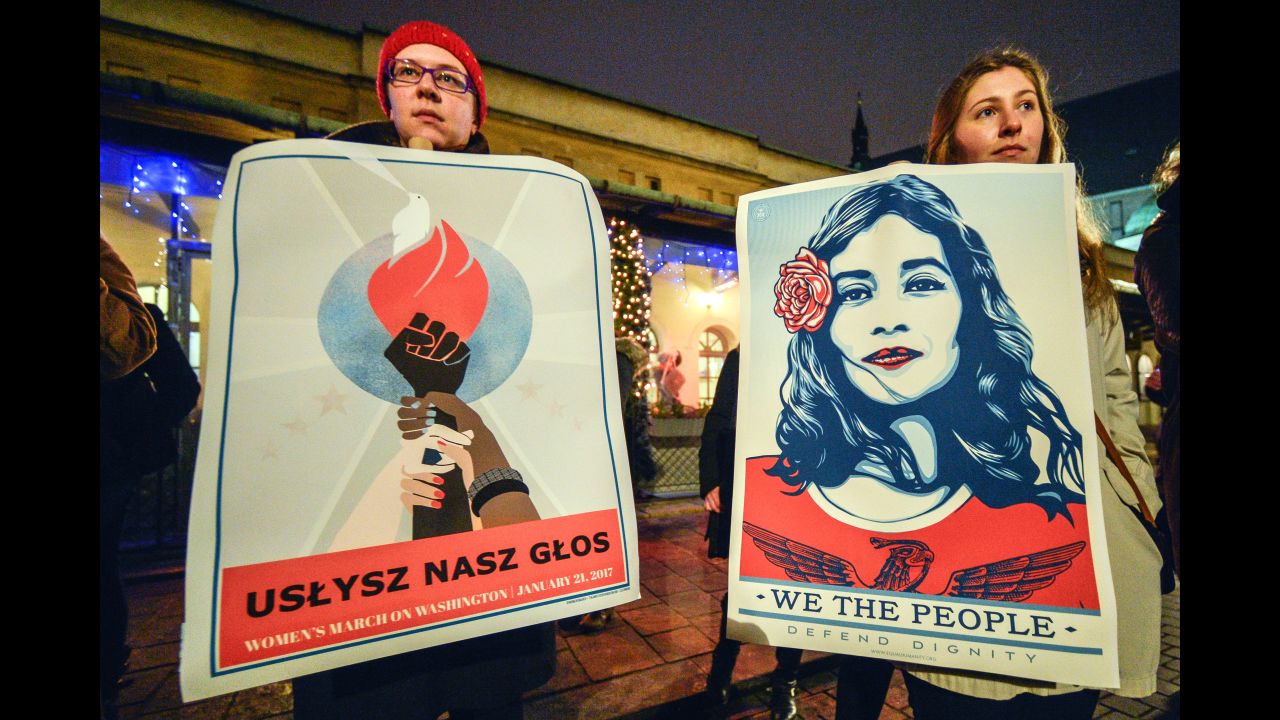 People gather outside the US Consulate in Krakow, Poland during the Women's March on Washington on January, 21 2017. 