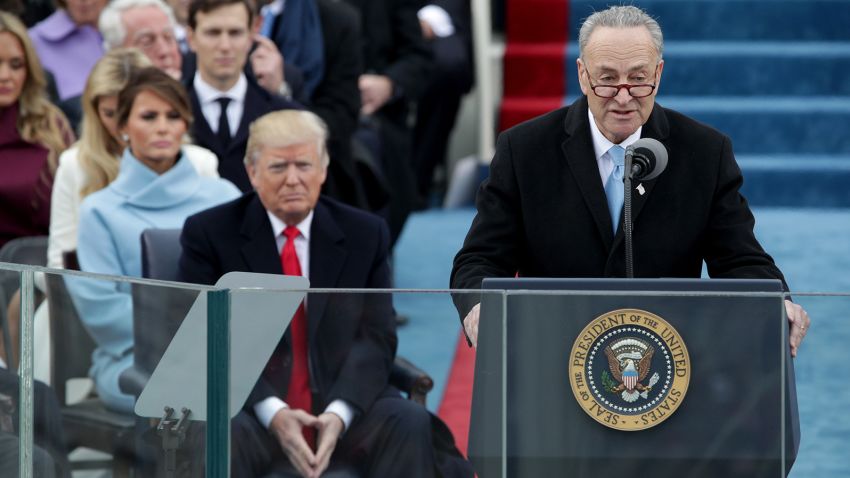 Sen. Chuck Schumer delivers remarks as President-Elect Donald Trump looks on on the West Front of the U.S. Capitol on January 20, 2017 in Washington, DC.