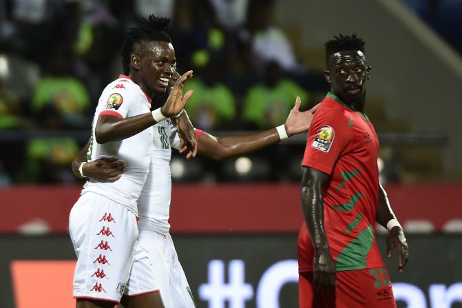Burkina Faso's Alain Traore and Bertrand Traore celebrate the second goal for the latter in the win over Guinea-Bissau, which left their side top of Group A.