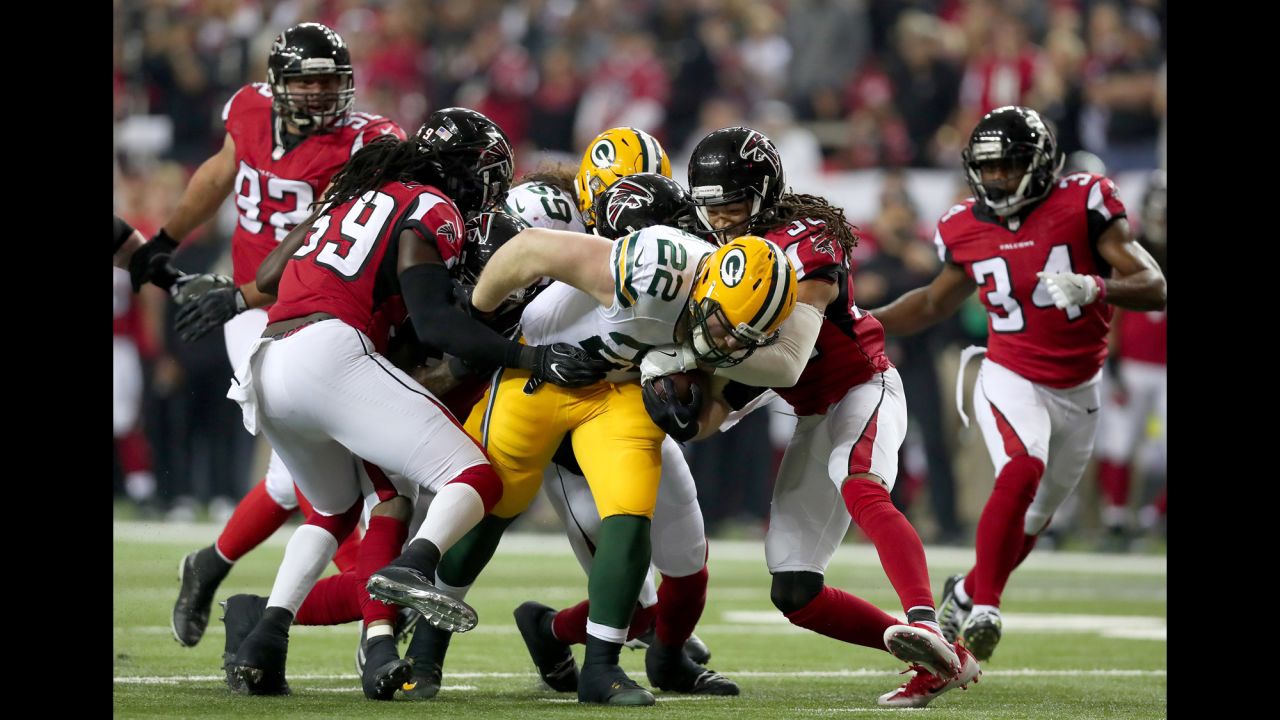 Packers fullback  Aaron Ripkowski fumbles the ball in the second quarter after contact with Falcons cornerback Jalen Collins.