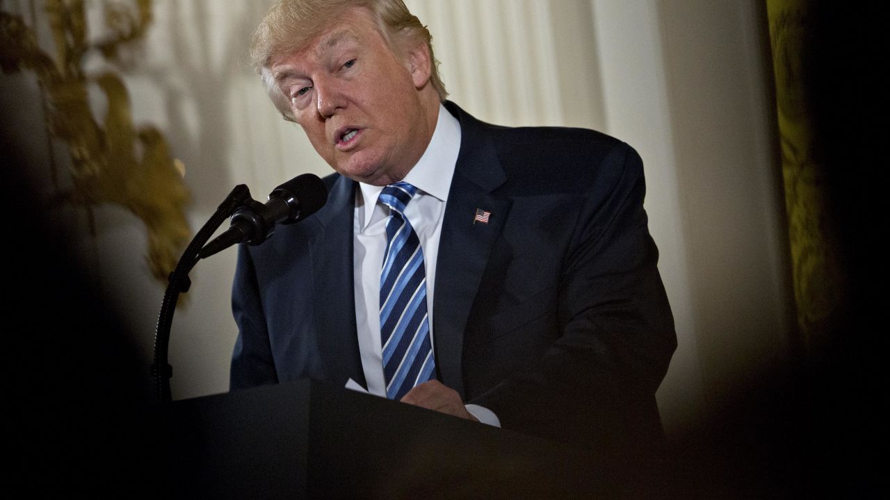 WASHINGTON, DC - JANUARY 22: U.S. President Donald Trump speaks during a swearing in ceremony of White House senior staff in the East Room of the White House on January 22, 2017 in Washington, DC. Trump today mocked protesters who gathered for large demonstrations across the U.S. and the world on Saturday to signal discontent with his leadership, but later offered a more conciliatory tone, saying he recognized such marches as a "hallmark of our democracy." (Photo by Andrew Harrer-Pool/Getty Images)