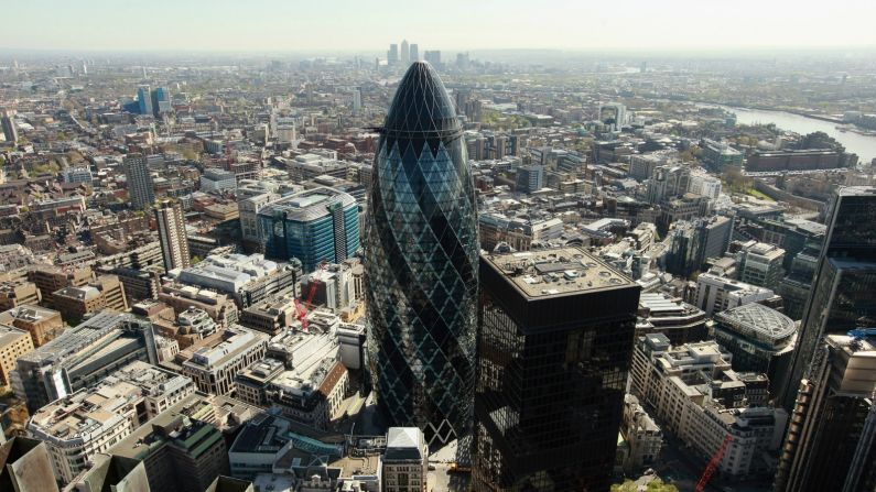 Nestled between more recent additions to the London skyline is Norman Foster's 30 St Mary Axe. Completed in 2003, it's popularly called the Gherkin (a British term for a pickled cucumber), due to its unconventional shape, designed to reduce wind deflection.<br />