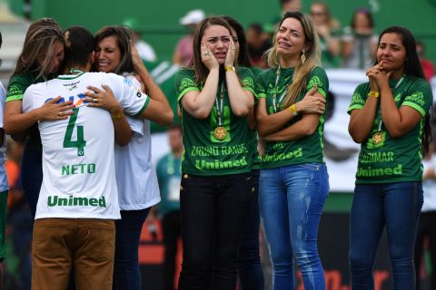 Helio Neto was one of only three Chapecoense players to survive a plane crash that killed 71 passengers in November. On Saturday, in the Brazilian club's first game since the tragedy, he joined relatives of those who died on the pitch at the club's stadium in Chapeco, Santa Catarina state.
