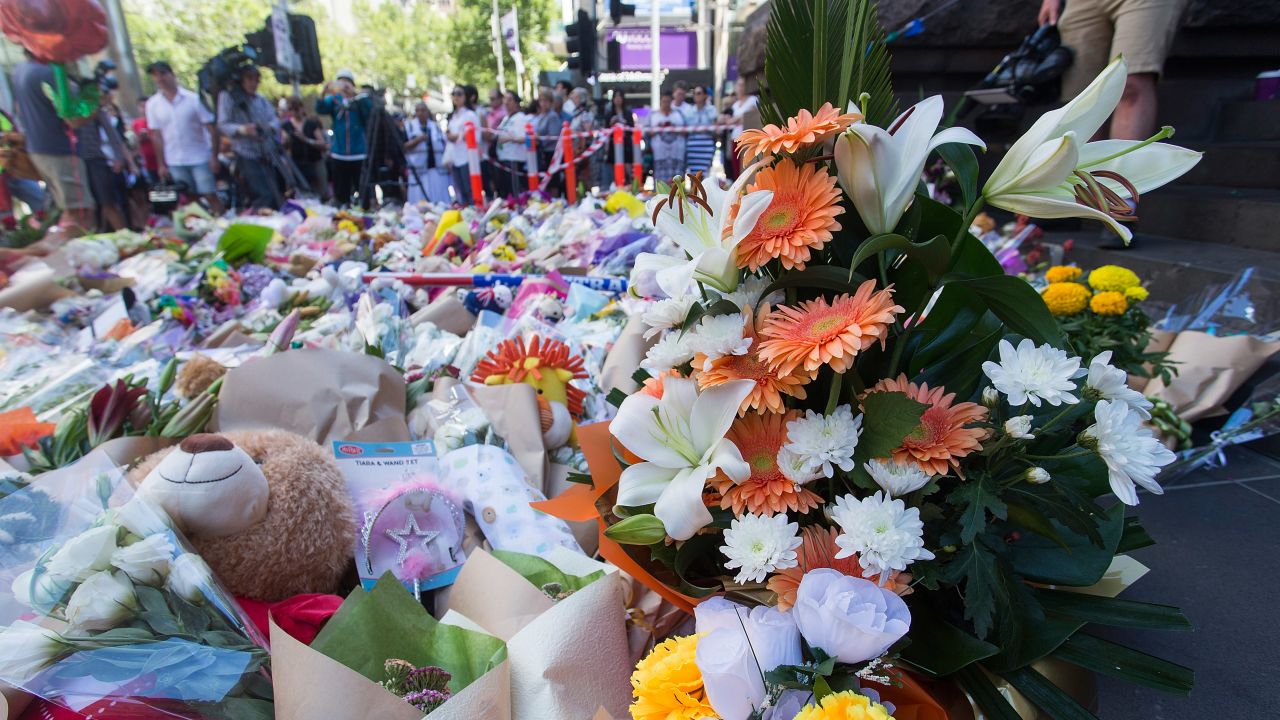Hundreds of flowers have been laid for those killed after a driver crashed his car into a crowd in downtown Melbourne.