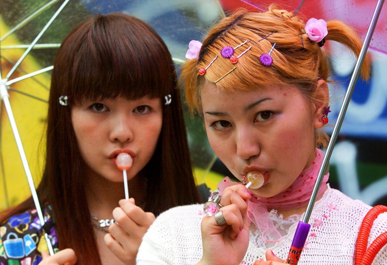 Japanese students hang out in Tokyo's popular fashion district.  