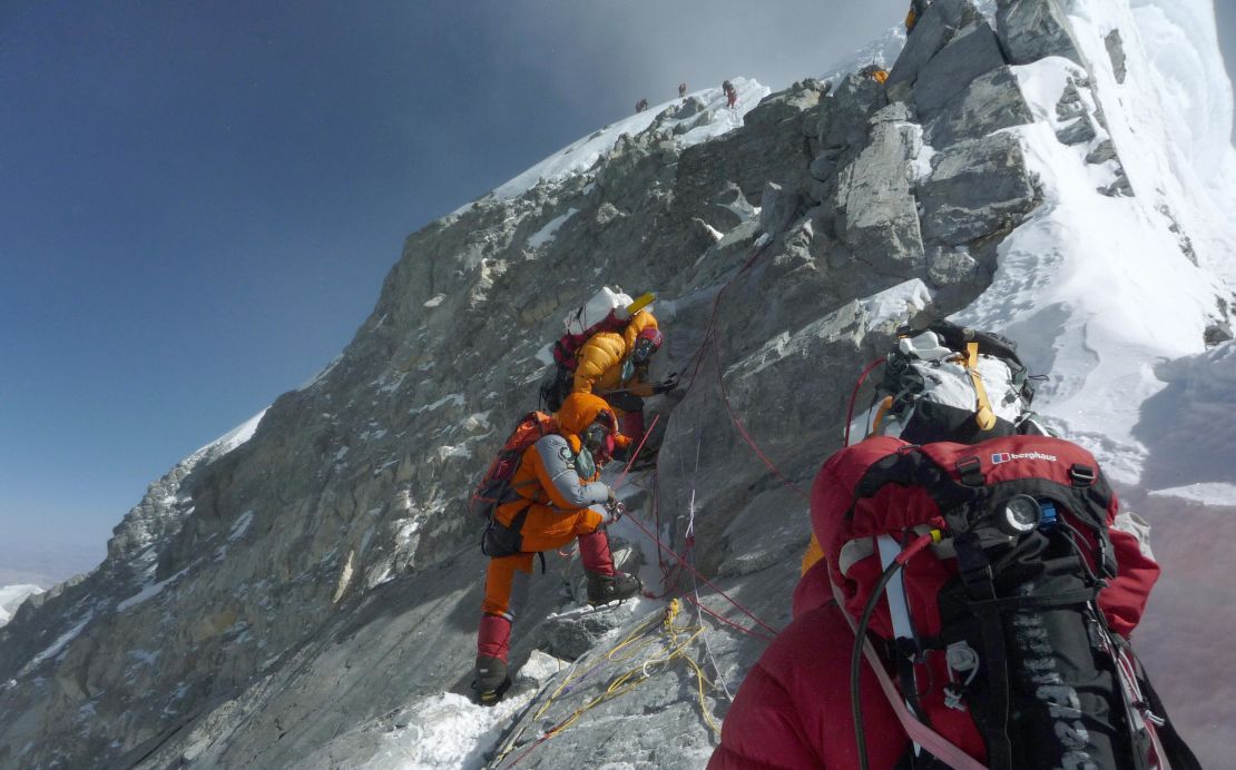 Mountaineers head for the summit of Everest. The height of the world's tallest mountain may have changed.