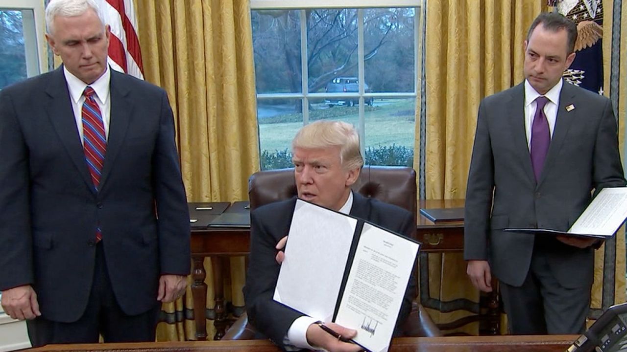 President Trump after signing executive actions in the first day of his presidency.