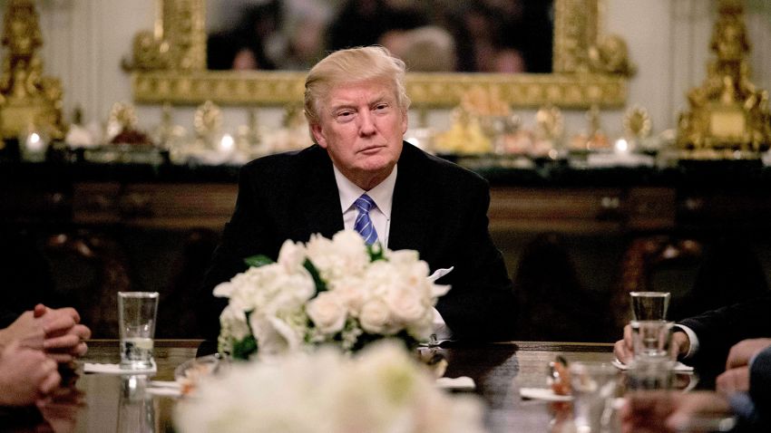 President Donald Trump looks on during a reception with Congressional leaders on January 23, 2017 at the White House in Washington, DC.