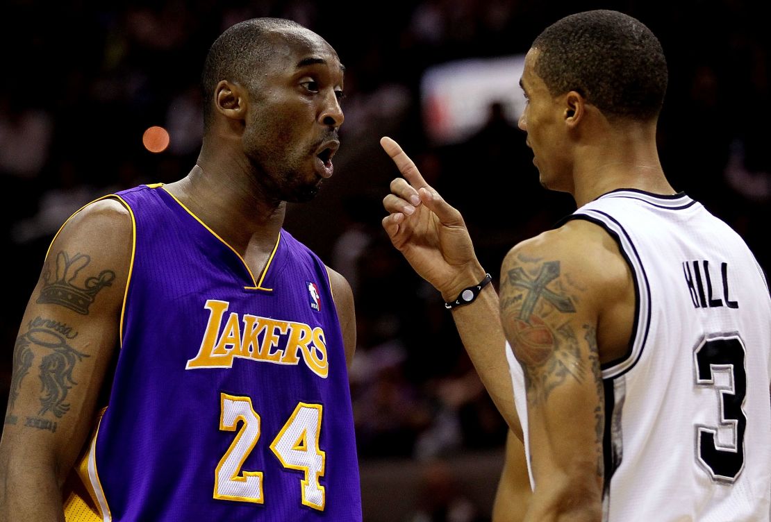 LA Lakers star Kobe Bryant (left) clashes with San Antonio's George Hill in 2010.