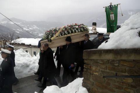 The coffin of avalanche victim Alessandro Giancaterino is carried to his funeral service in Farindola, central Italy, on Tuesday, January 24. A series of earthquakes that struck on January 18 caused an avalanche at the foot of Gran Sasso mountain in central Italy, about 135 kilometers (85 miles) northeast of Rome, burying guests and staff of Hotel Rigopiano, a local mountain resort.