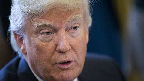 President Donald Trump speaks after signing executive orders related to the oil pipeline industry in the Oval Office of the White House January 24, 2017 in Washington, DC.