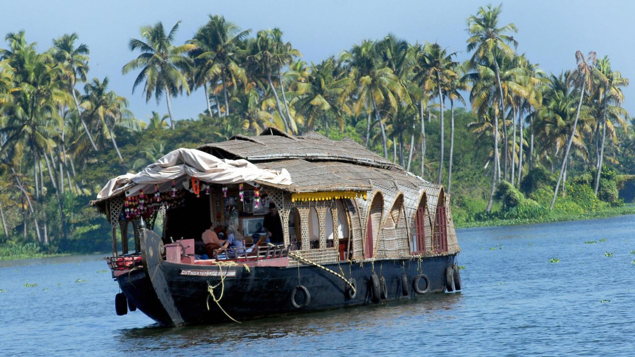 Houseboat rides in the backwaters of Kerala, India, are popular.