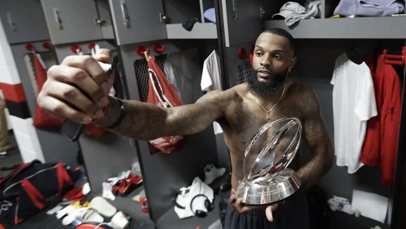 Atlanta wide receiver Justin Hardy takes a selfie with the George Halas Trophy after the Falcons won the NFC Championship on Sunday, January 22. <a href="http://www.cnn.com/2017/01/22/us/nfl-playoffs-nfc-and-afc-championship-games/index.html" target="_blank">Atlanta will play New England</a> in the Super Bowl next month.